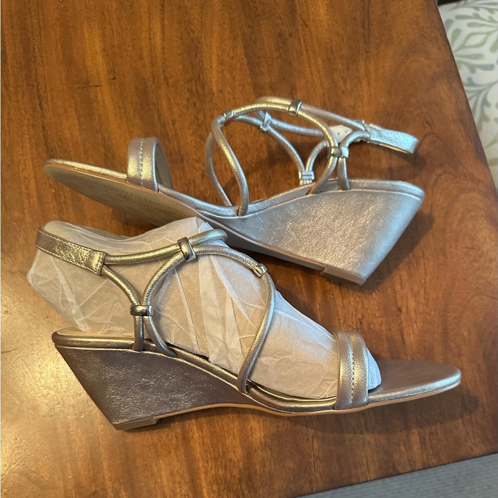 Isola Wedge Sandal- brand new never worn. Paid $105. Pretty light gold color